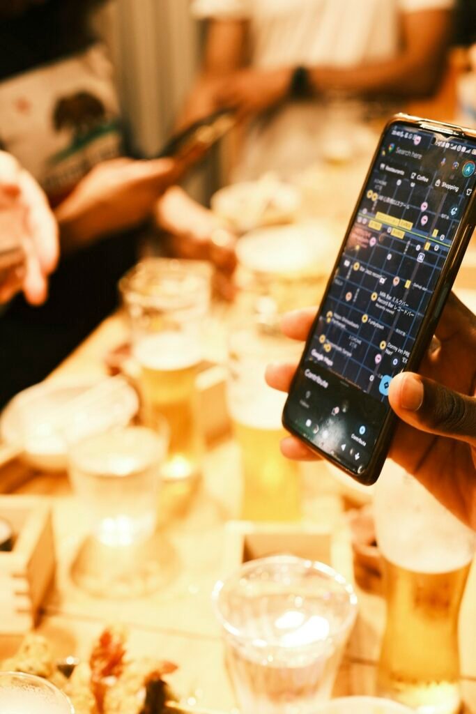 Person holding a smartphone with a map app open, representing ChatGPT local business discovery