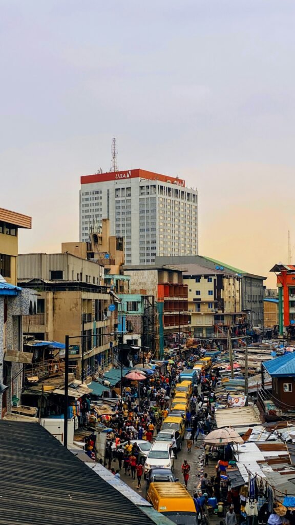 Busy city street traffic in Lagos, Nigeria, representing a comparison of local SEO markets
