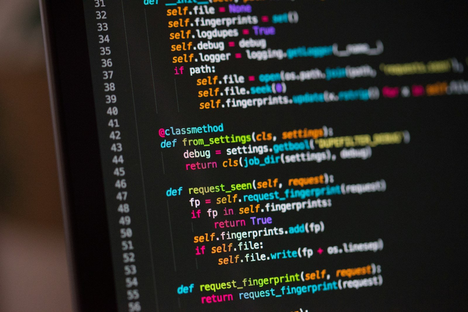 Computer screen displaying JavaScript code representing closures