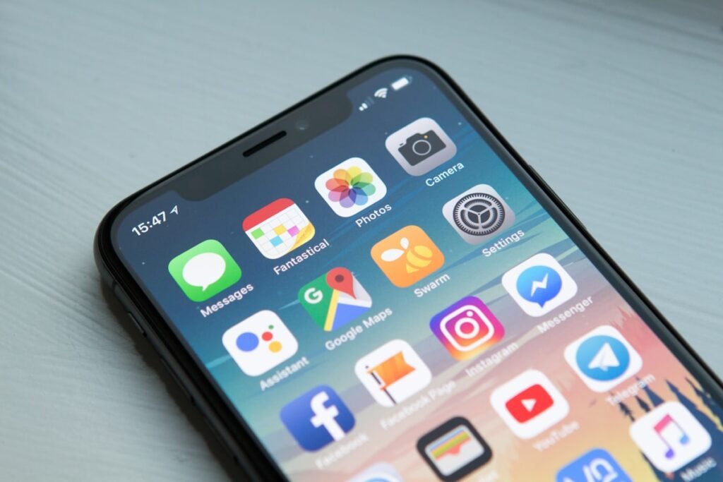 Person browsing a website on a mobile phone representing mobile-first indexing