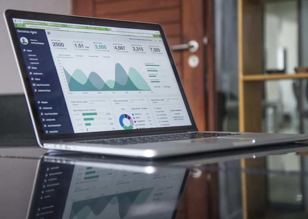 Laptop displaying statistics and data on screen, representing Next.js SEO metadata