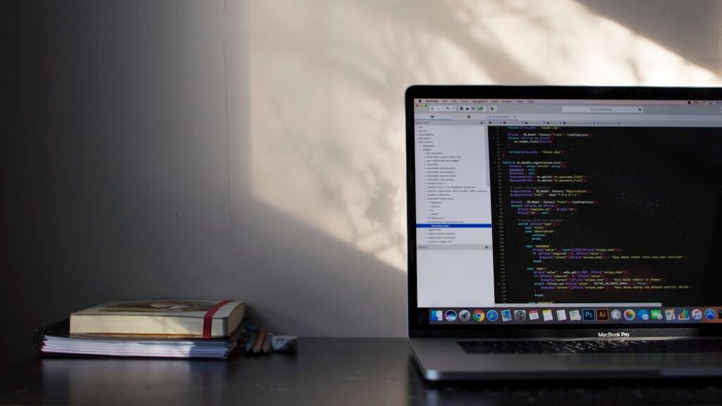 MacBook Pro showing programming code representing Next.js Server Actions