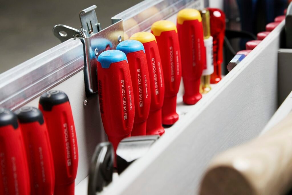 Tools neatly organized in a toolbox, representing reusable logic packaged into React custom hooks