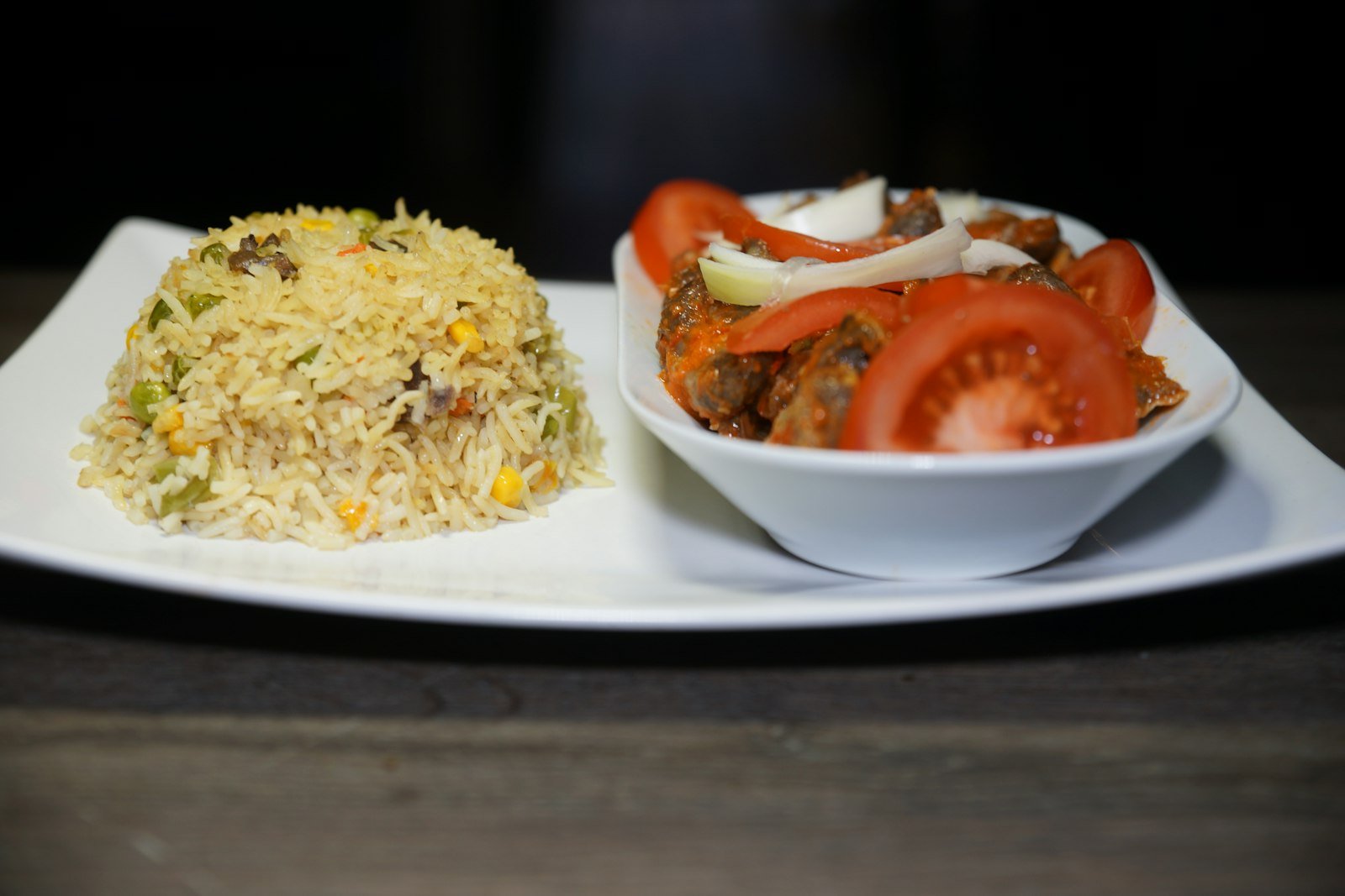 West African dish with rice, tomato and egg representing African restaurant cuisine