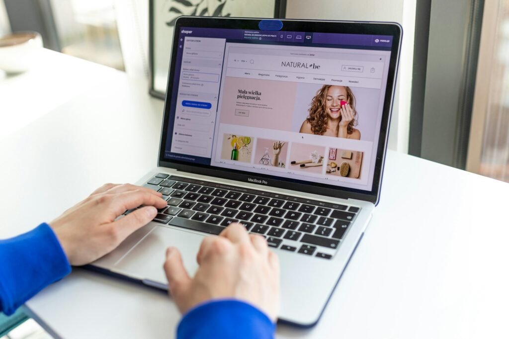 Online store owner working on a laptop, representing Shopify SEO for US stores
