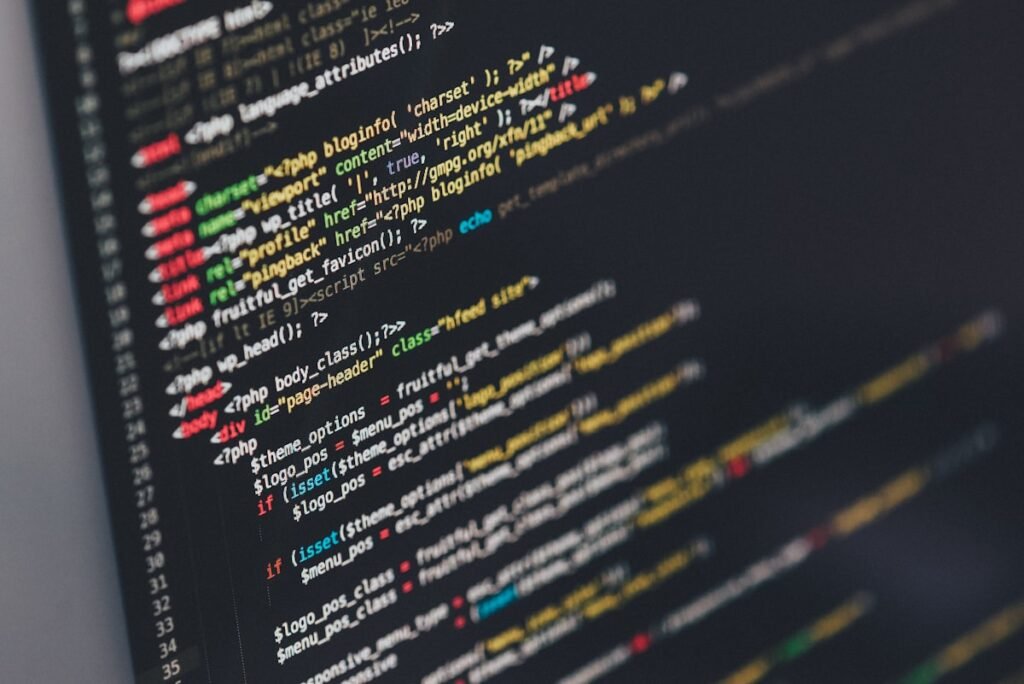 Website code and structure on a laptop screen representing an XML sitemap