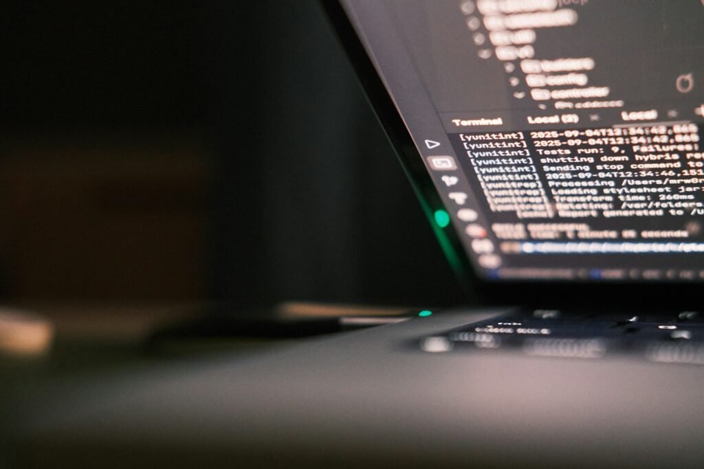 Laptop screen showing lines of code, representing technical documentation and crawl budget guidance
