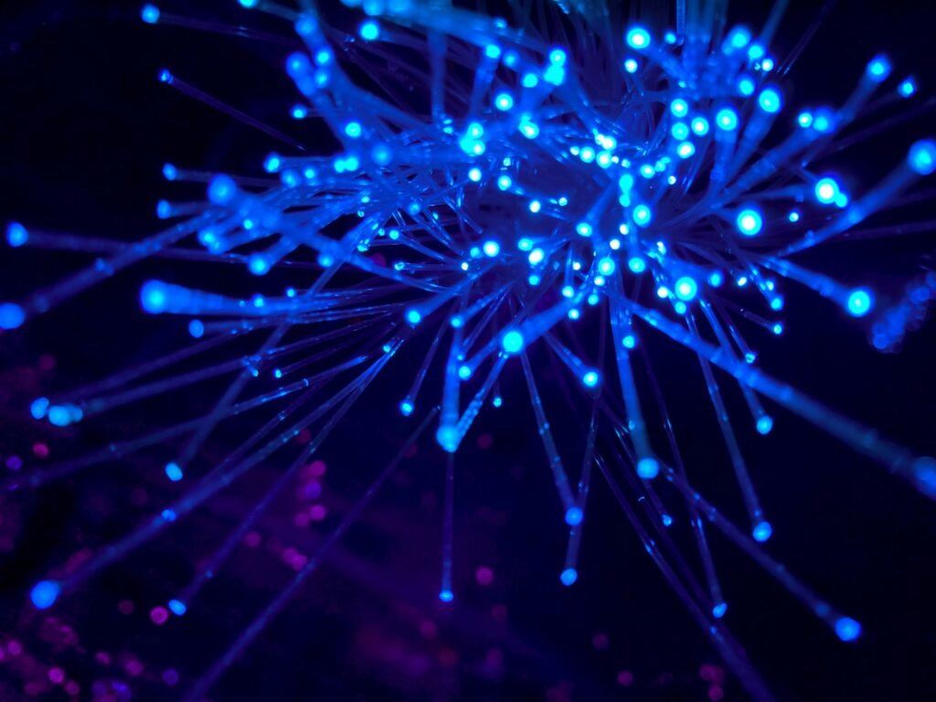 Purple and blue digital network light streaks, representing headless WordPress connecting to a React frontend
