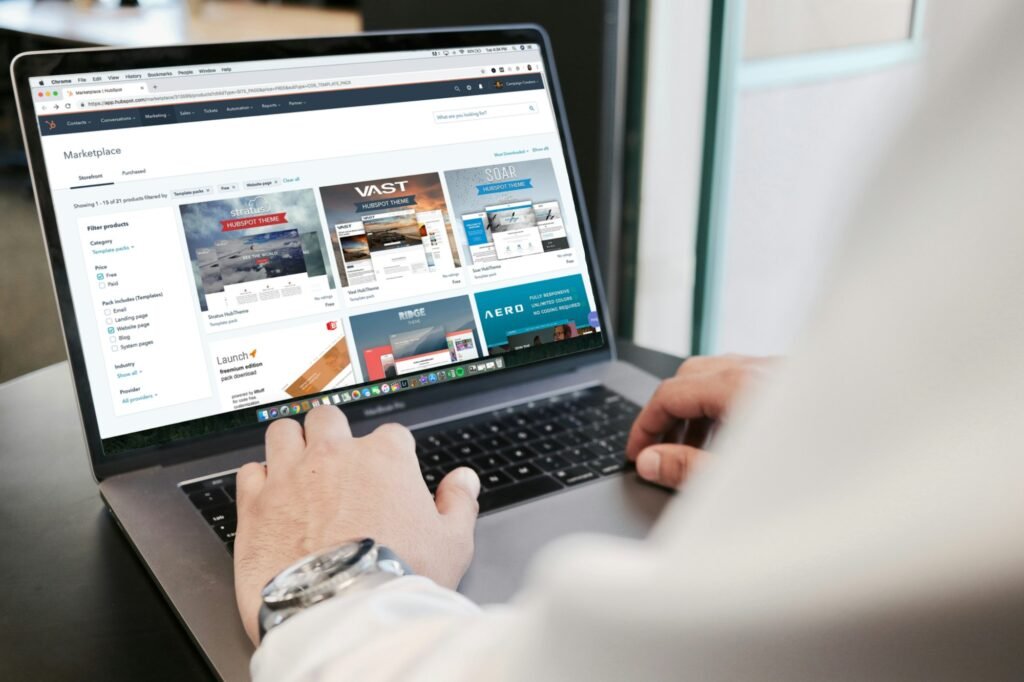 Person using a MacBook Pro, representing how much a landing page costs