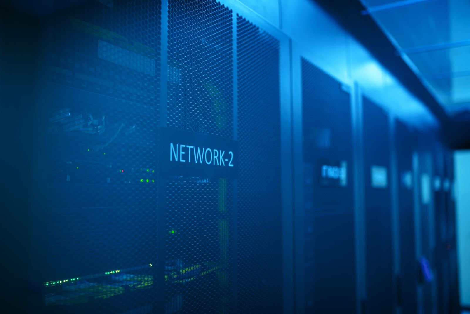 Illuminated server room network rack representing caching and server-level WordPress performance tuning