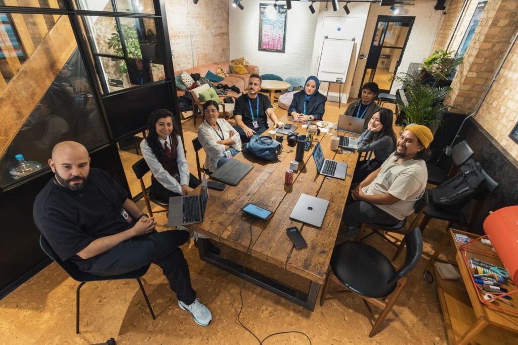 Developers collaborating on a decision between Elementor and custom-coded WordPress development