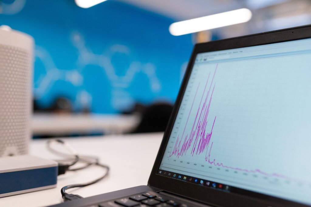 Laptop showing an analytics growth graph representing a Nigeria-based SEO case study reaching a US audience
