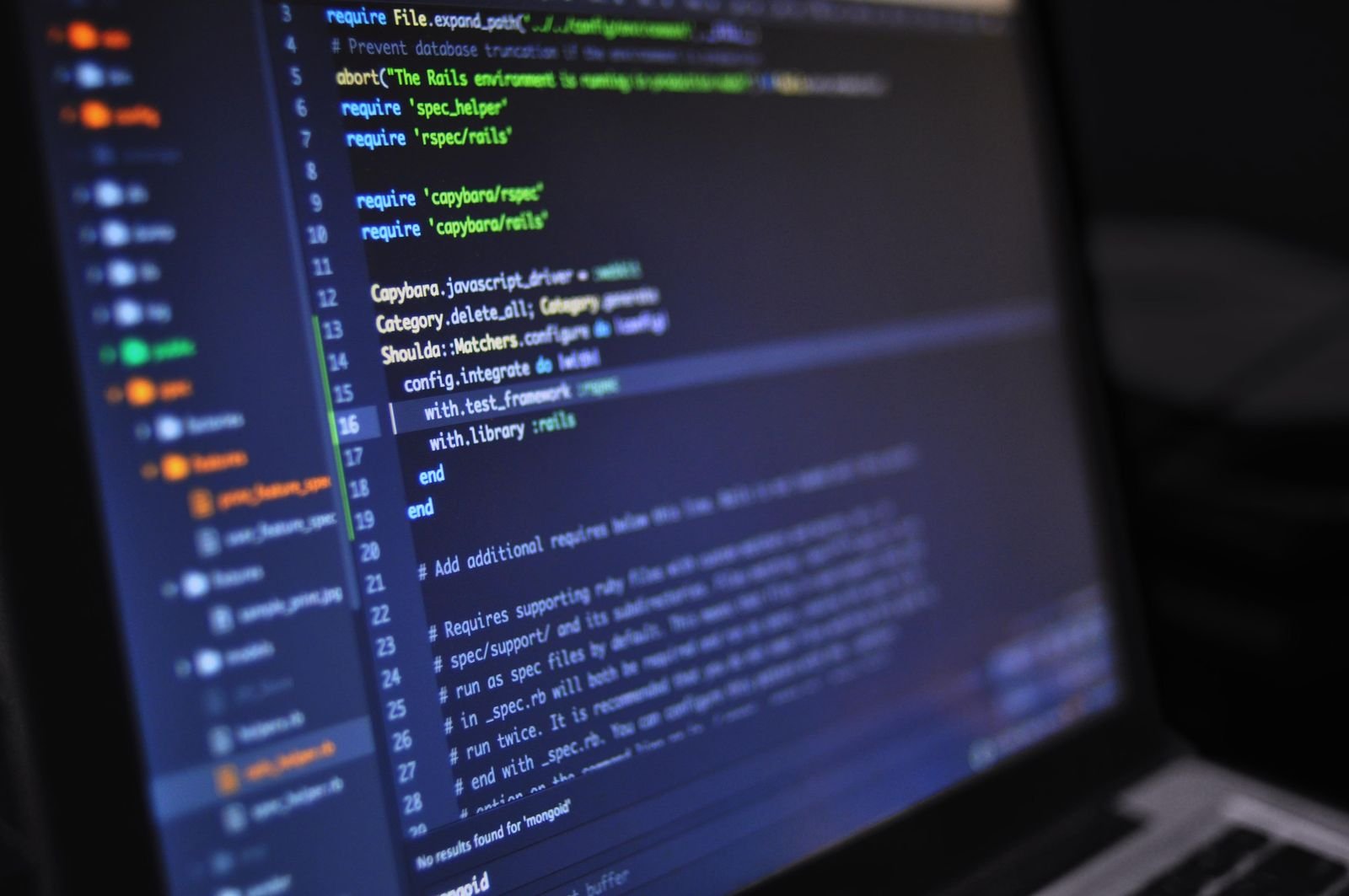 Close-up of custom code on a dark screen representing hand-coded WordPress development versus a page builder