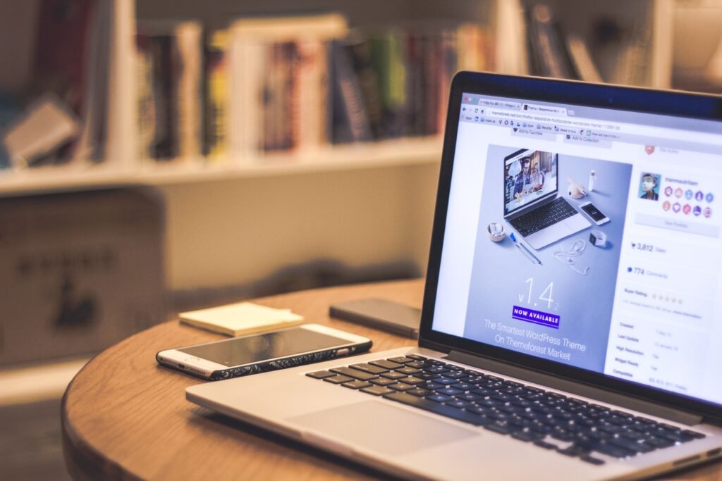 Laptop displaying a custom website homepage, representing custom WordPress theme development