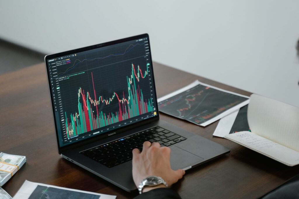Laptop screen displaying a data chart, representing an SEO client reporting dashboard